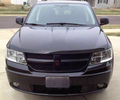 Black grill, custom red and black Dodge badge