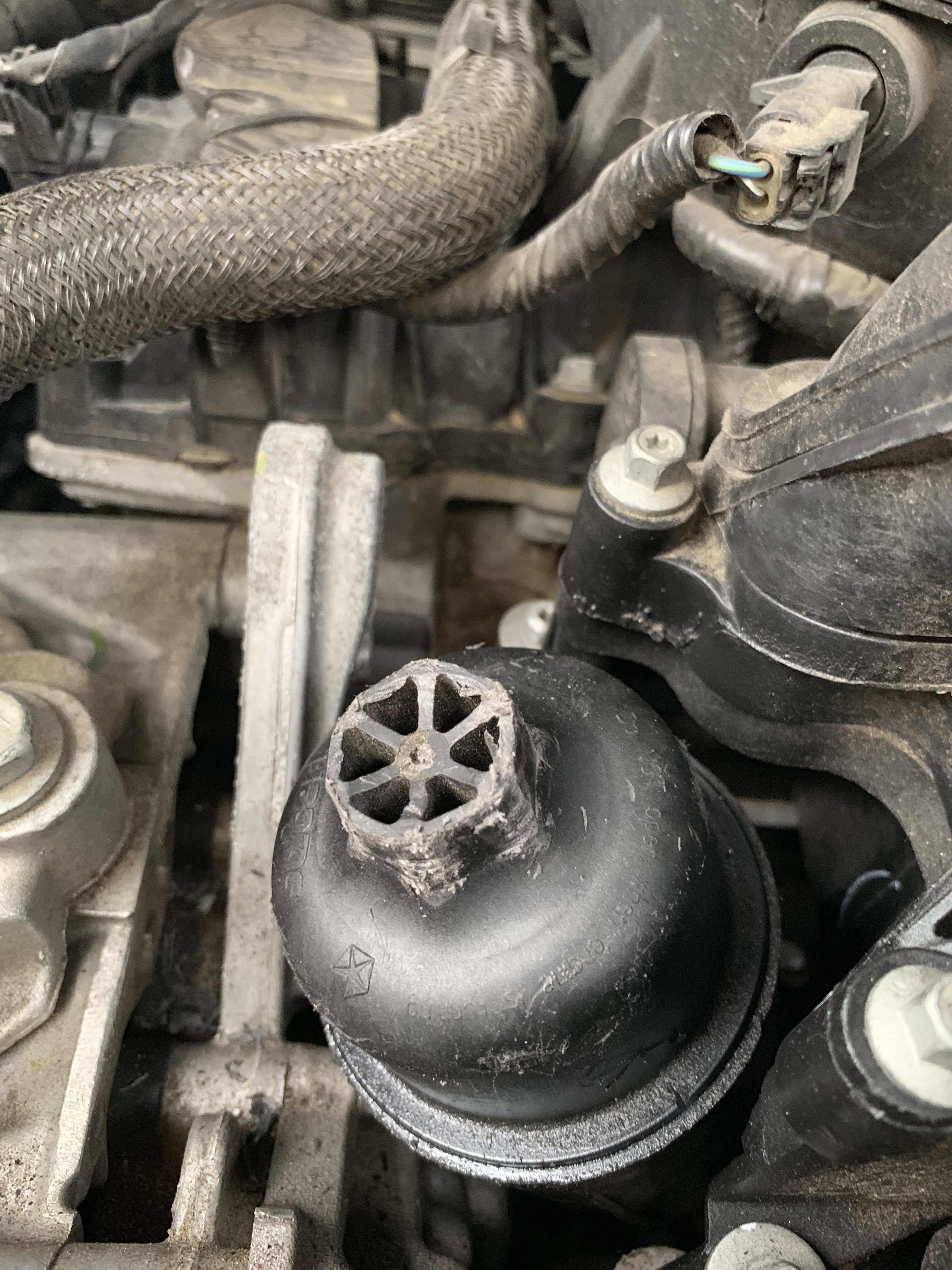 How to Remove a Stuck Oil Filter Cap  
